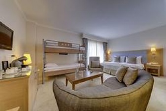 Oda Görseli: Premium Oda Balkonlu Kısmi Deniz Manzaralı / Yarım Pansiyon